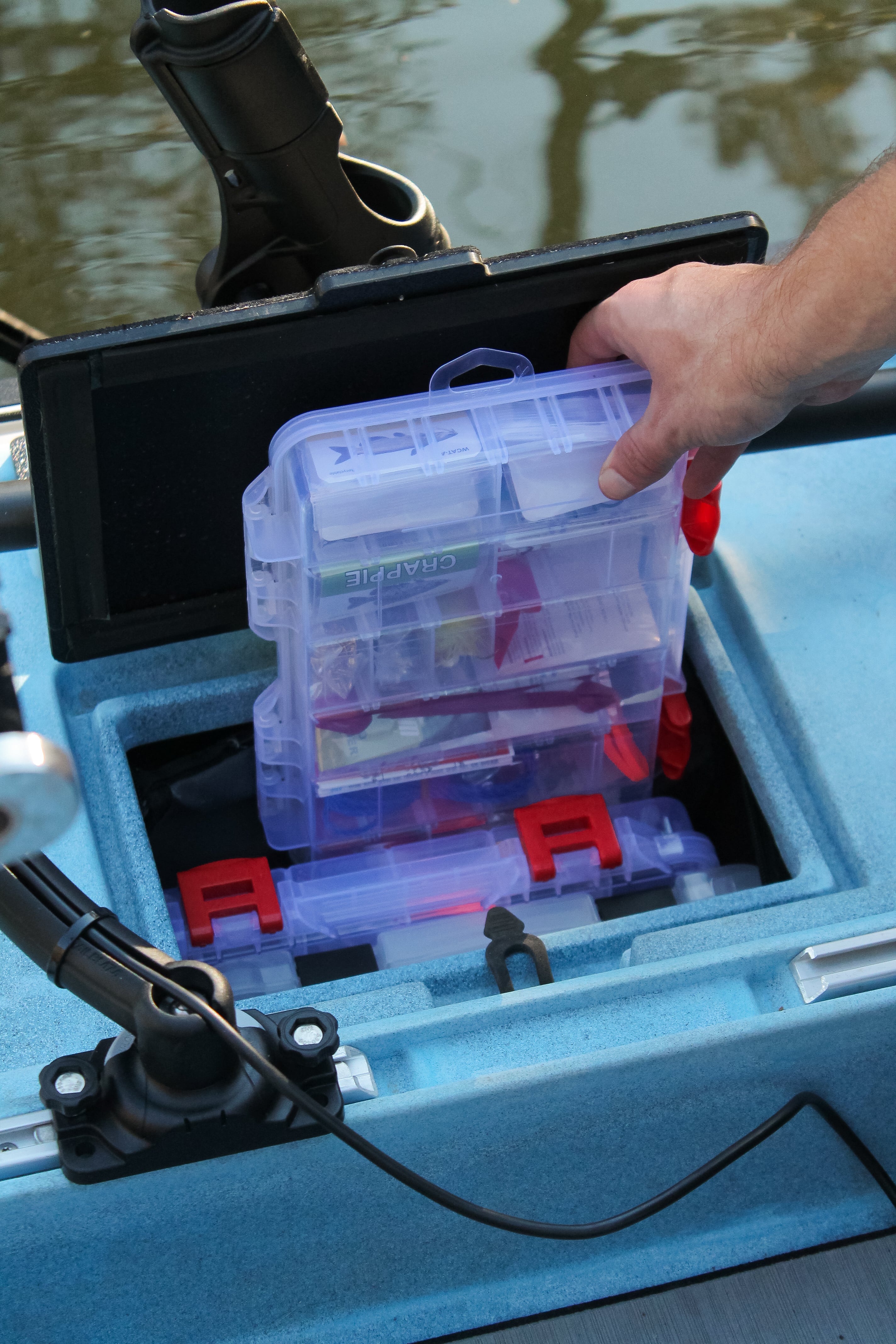 Fishing tackle storage in portable Flip-Kat® Kayak